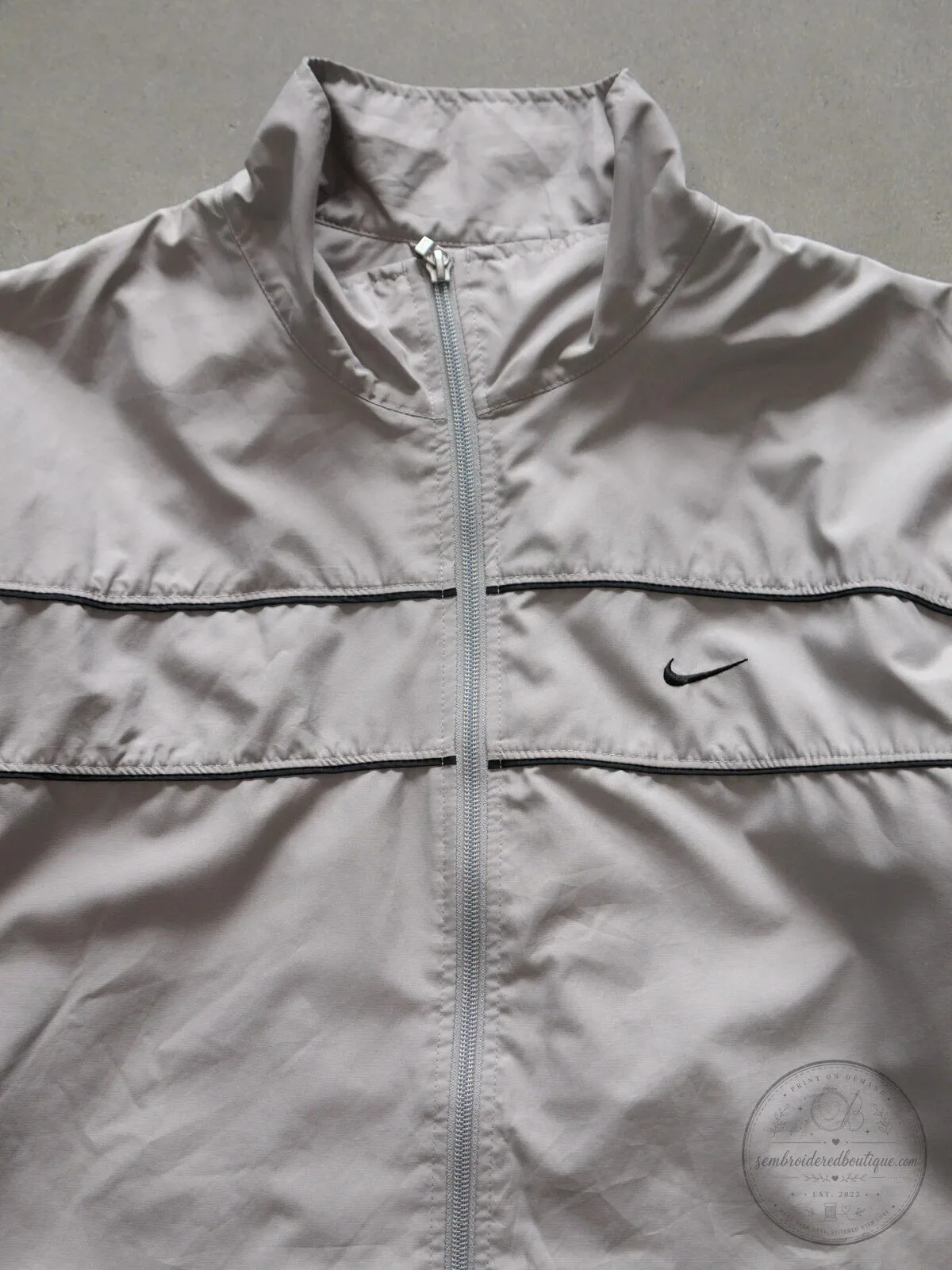 Vintage Nike Beige Windbreaker Jacket with Black Stripes and Swoosh Logo 11 Vintage Nike Beige Windbreaker Jacket with Black Stripes and Swoosh Logo