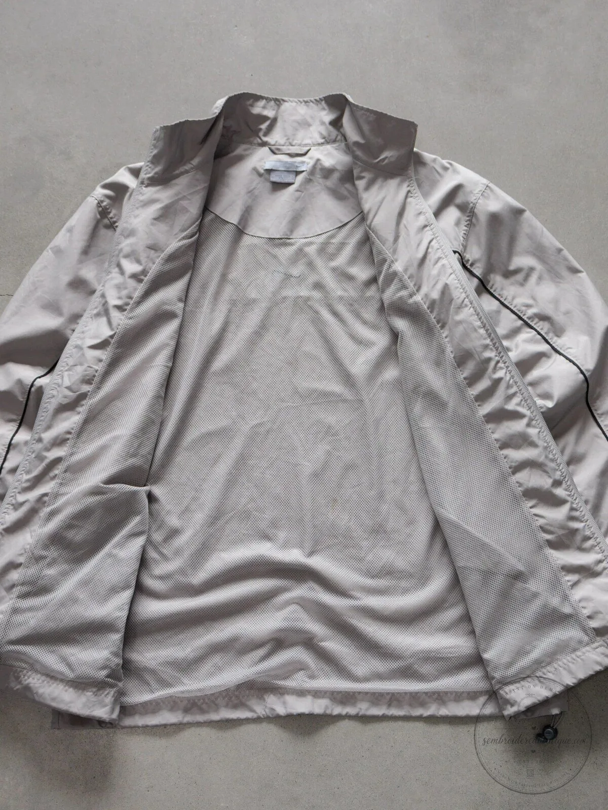 Vintage Nike Beige Windbreaker Jacket with Black Stripes and Swoosh Logo 12 Vintage Nike Beige Windbreaker Jacket with Black Stripes and Swoosh Logo
