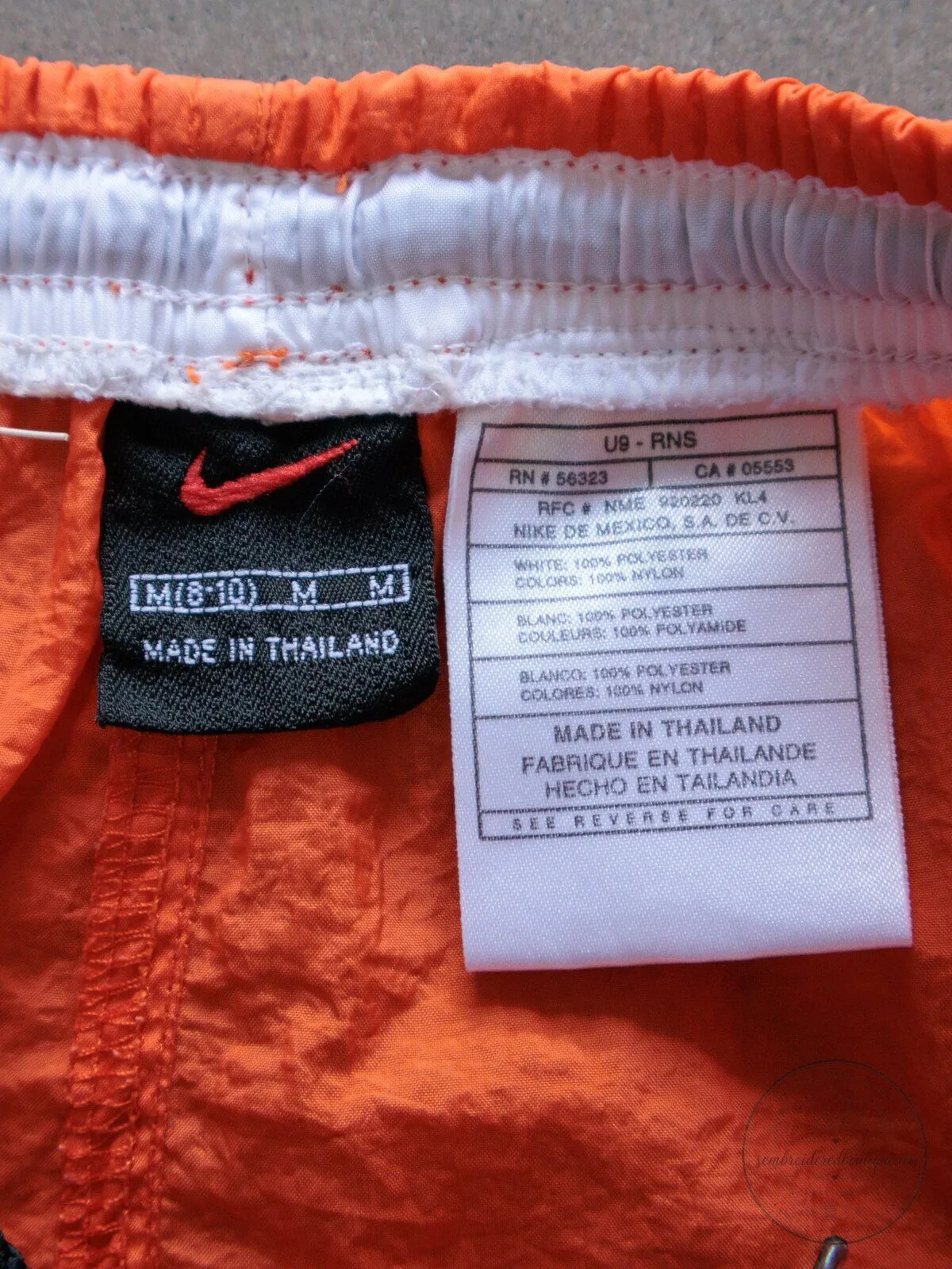 Vintage Nike Orange Swim Shorts for Women with White Swoosh Logo 7 Vintage Nike Orange Swim Shorts for Women with White Swoosh Logo